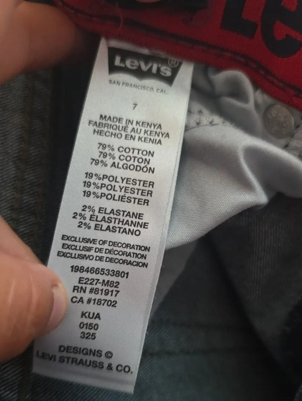 Levi's Blue Denim Straight Jeans with Red Waistband Accent